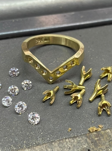 Consider your style preferences including precious metal and gemstones.